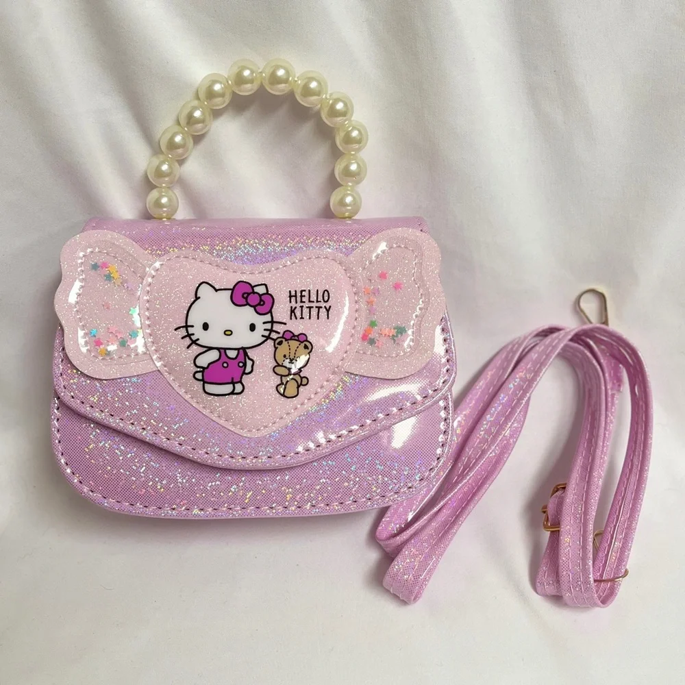 Hello Kitty Pink Glitter Purse, NIB, 6.5 x4.5”, crossbody strap incl, all ages